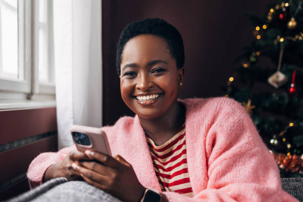 istock Woman Browsing Social Media On Her Cell Phone Device 1427719894