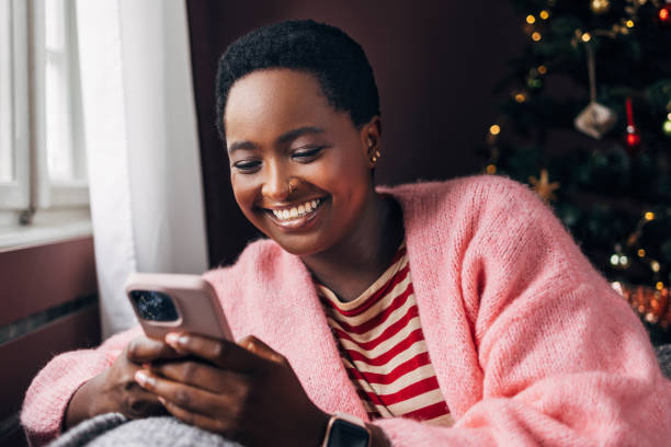 istock Woman Browsing Social Media On Her Cell Phone Device 1427719895
