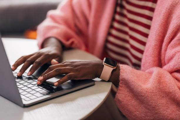 istock Anonymous Woman Working On A Laptop 1427720138