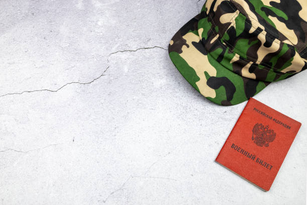 military cap, military id of a citizen of the russian federation. space for text. translation: military id. - federation imagens e fotografias de stock