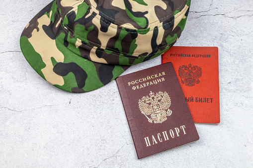 The concept of mobilization. Text in Russian PASSPORT OF THE RUSSIAN FEDERATION and MILITARY ID