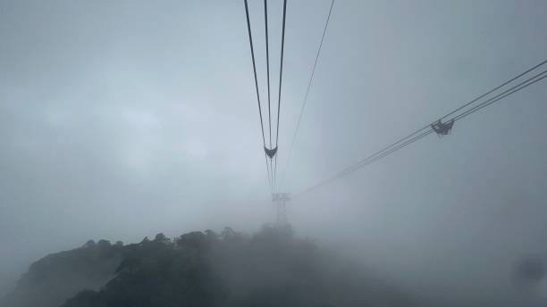istock Foggy mountain shot from the cable car 1427728543