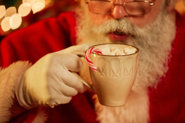 istock Santa Claus Enjoying Hot Coco 1427748501