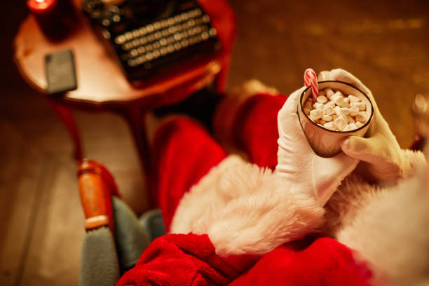 istock Santa With Hot Cocoa Cup 1427748524