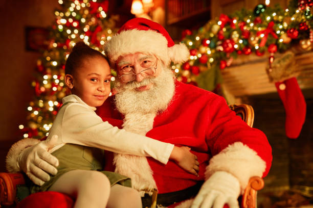 istock Little Girl With Santa 1427748565