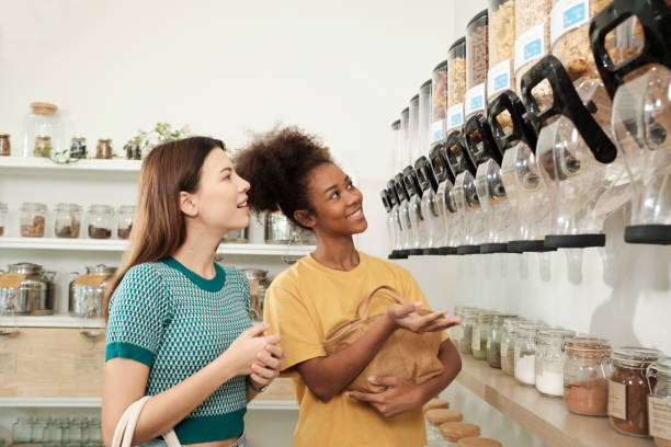 istock Two young women shopped in refill store, reusable bags, and zero-waste grocery. 1427766310