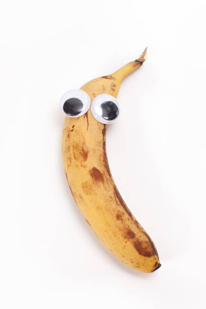 istock banana with eyes isolated on white background 1427784087