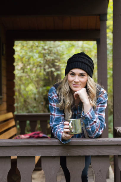 istock Woman at a Cabin on Vacation in Oregon 1427796729