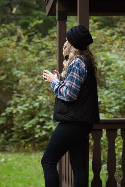 istock Woman at a Cabin on Vacation in Oregon 1427796730