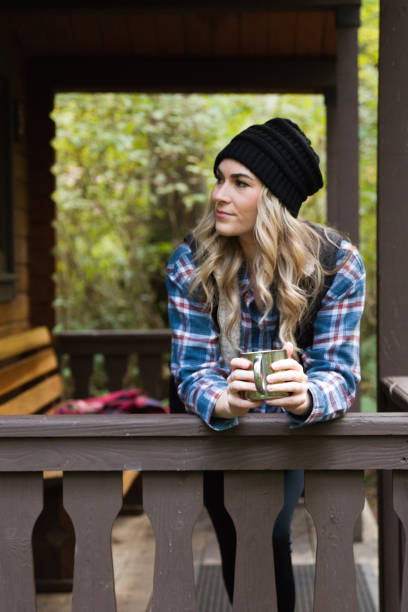 istock Woman at a Cabin on Vacation in Oregon 1427796741