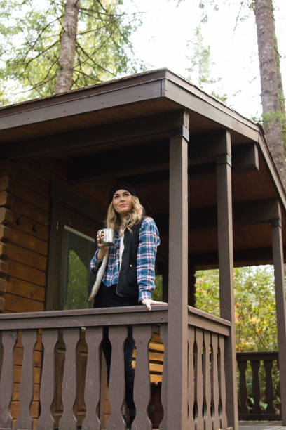 istock Woman at a Cabin on Vacation in Oregon 1427796743