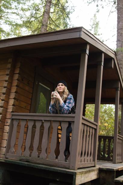 istock Woman at a Cabin on Vacation in Oregon 1427797073