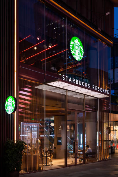 Starbucks coffee shop facade at night in Chengdu stock photo