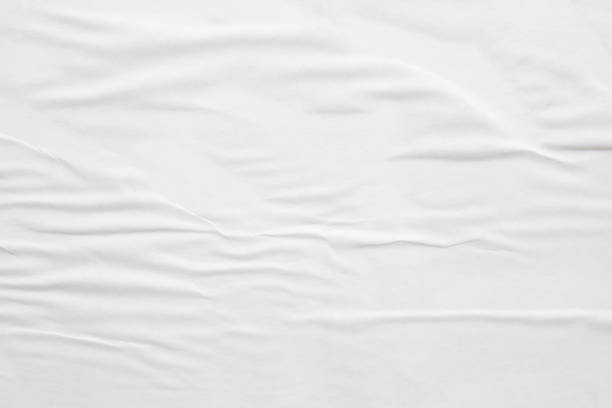 istock white crumpled and creased paper poster texture background 1427802827