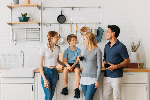 istock Happy family in modern kitchen 1427804119