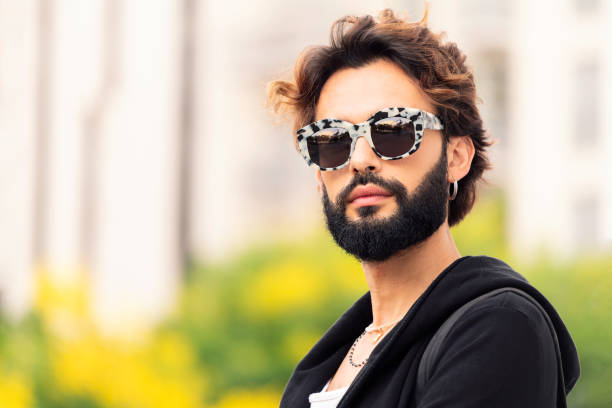 istock man with fashionable sunglasses looking at camera 1427804567