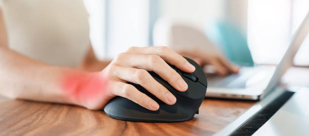 istock woman hand using computer ergonomic mouse, prevention wrist pain because working long time. De Quervain s tenosynovitis, Intersection Symptom, Carpal Tunnel Syndrome or Office syndrome concept 1427828172