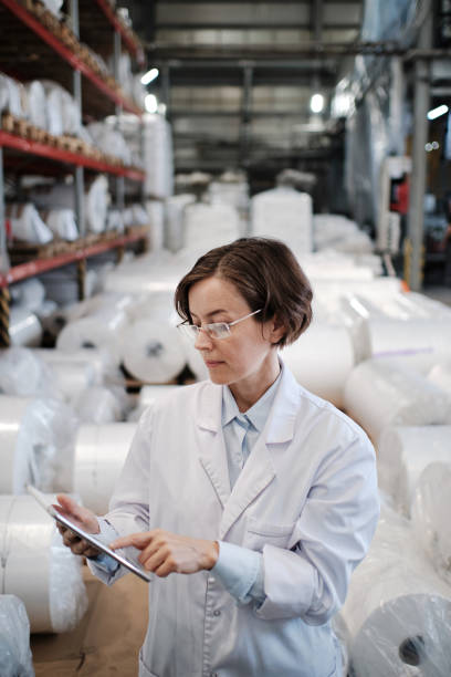 istock Female worker using tablet at the factory 1427844626