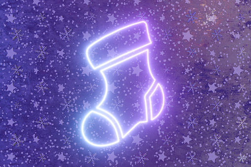 Christmas ornament sock neon lighting sign on black snowy wall, 3d render.