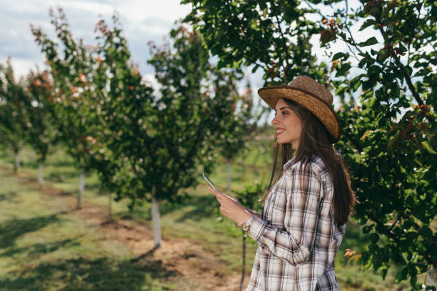 istock woman farmer on field 1427854687