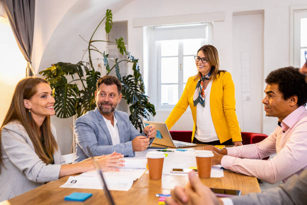 istock Group of business people working in office. 1427857517