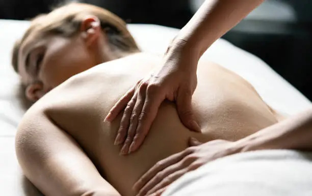 Photo of Healthy and beautiful woman in spa. Recreation, energy, health, massage