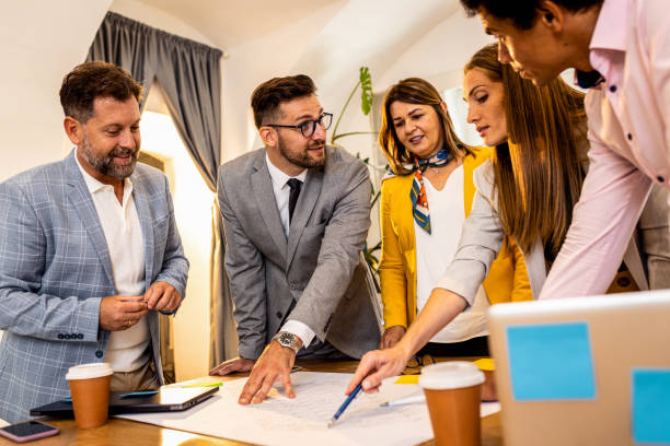 istock Group of business people working in office. 1427861861