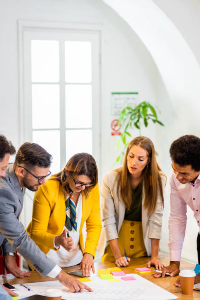 istock Group of business people working in office. 1427864095