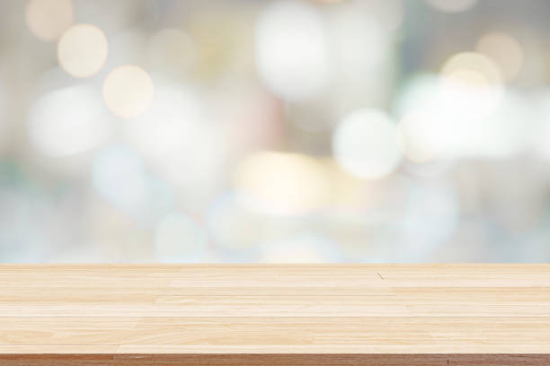 istock Empty wooden table for present product on bokeh blur background image. 1427869820
