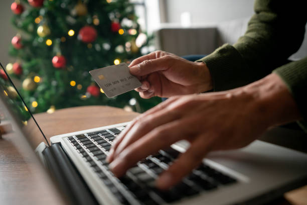 istock Close-up on a man doing his Christmas shopping online 1427870864