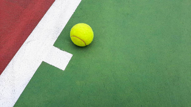 istock Tennis ball on court 1427871656