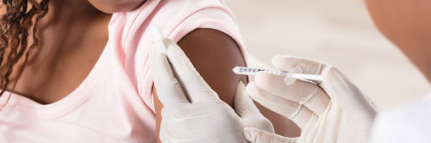 istock Doctor Applying Injection To Patient 1427872125