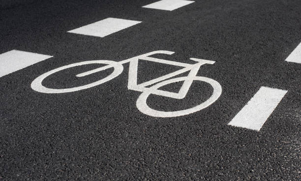 bicycle icon marking a bike lane on a road stock photo