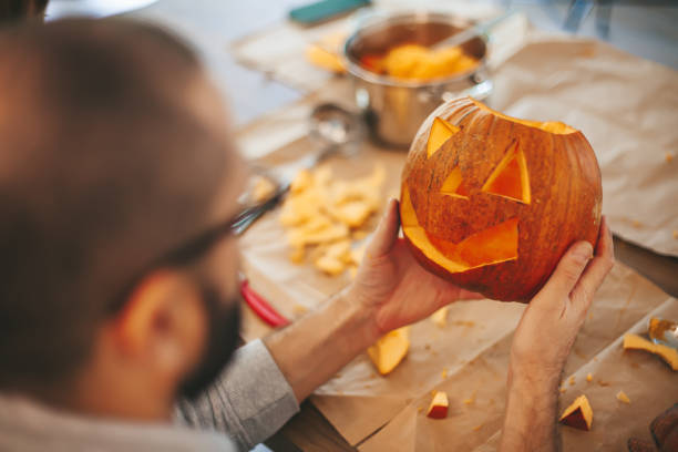 istock Pumpkin carving for Halloween 1427882074