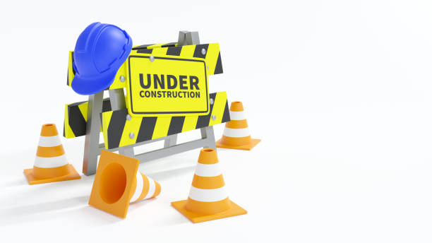 istock Under construction . Barrier with safety hat and traffic cone . Isolated white background . 3D rendering . 1427910120