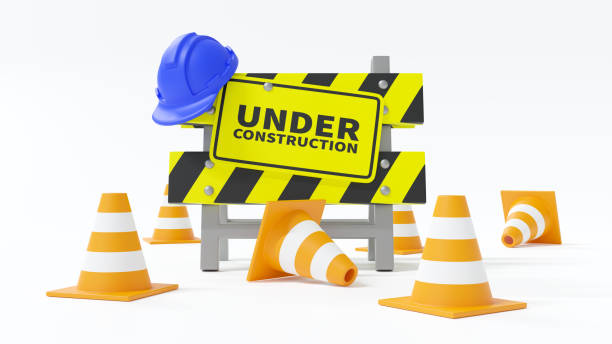 istock Under construction . Barrier with safety hat and traffic cone . Isolated white background . 3D rendering . 1427910121