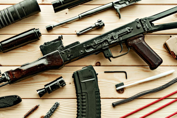 istock Gunsmith's working table for gun cleaning and maintaining 1427910372