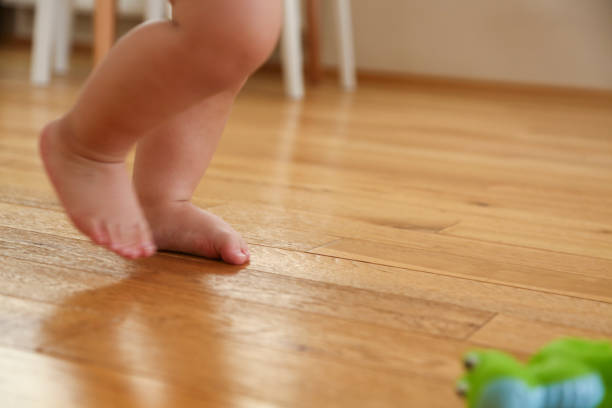 istock First steps of a baby 1427913525