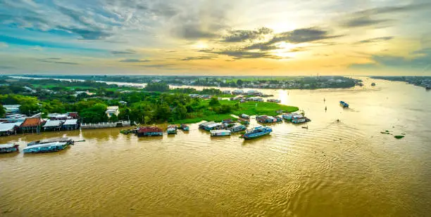 Photo of Floating village along Hau river over Vietnam border area, aerial view