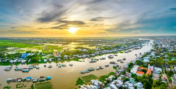 Photo of Floating village along Hau river over Vietnam border area, aerial view