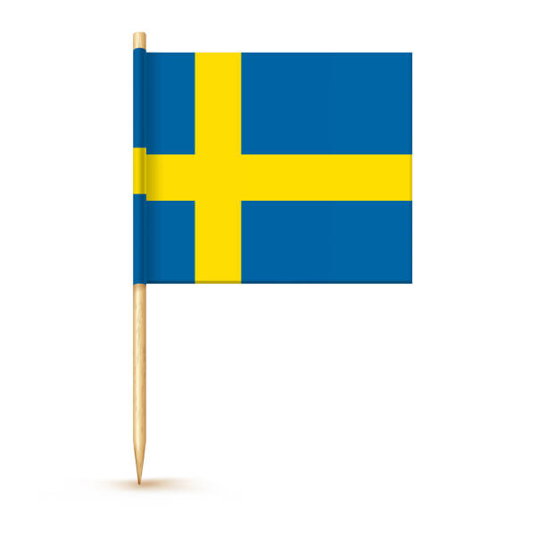 istock Swedish toothpick flag isolated on wood stick with white paper. Realistic little tooth pick for lunch. Vector cocktail decoration 1427923556
