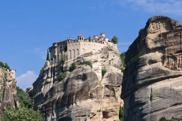 Photo of Rising high above the Thessalian plain, the sandstone megalith on which the Varlaam monastery was built, reaches a height of 370 m - almost halfway to heaven! Meteora, Greece