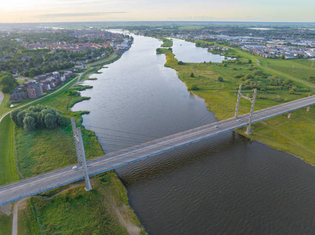 istock Suspension bridge over the river IJssel 1427925283