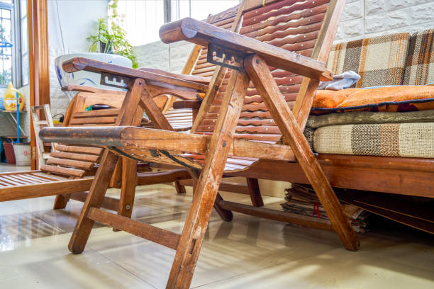 A traditional old folding armchair with backrest indoors