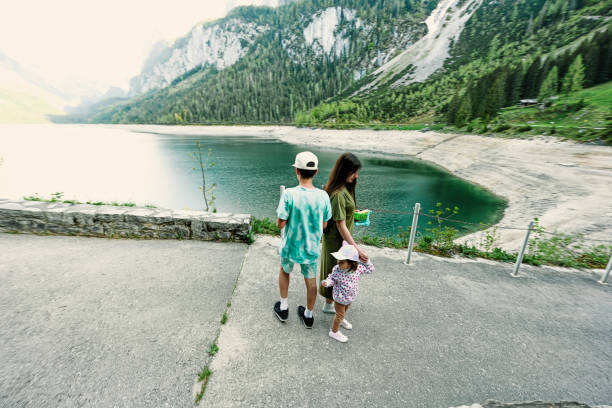 istock Mother with kids at Vorderer Gosausee, Gosau, Upper Austria. 1427930342