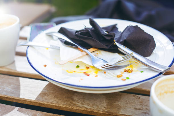 istock Dirty plates and forks after dinner 1427930842