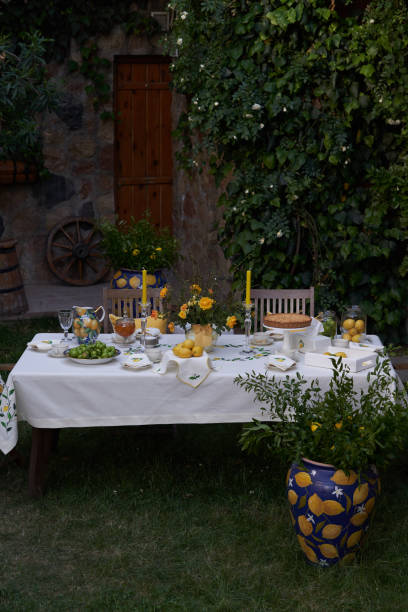istock Table with apple pie, fruits snacks. Spring concept 1427935337