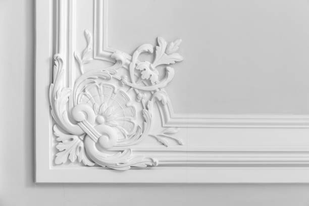 istock White wall with classic stucco decoration, vintage style 1427936472