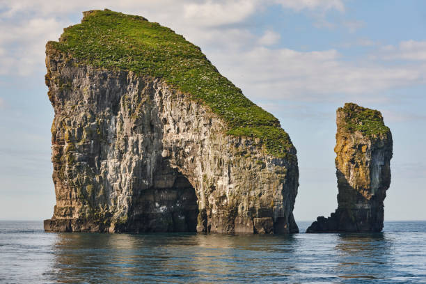 istock Faroe islands coastline cliffs landscape in Vagar island. 1427941774