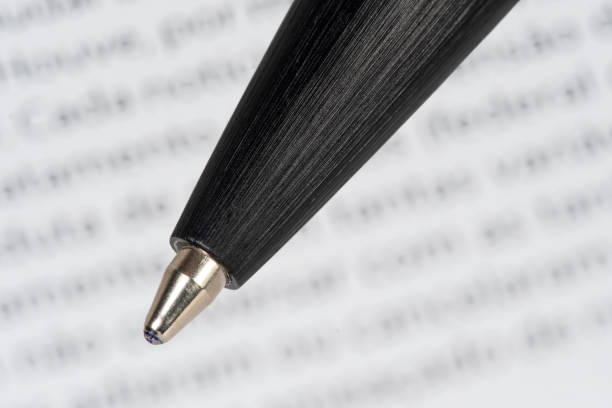 istock ballpoint pen tip detail with blurred background. 1427945946